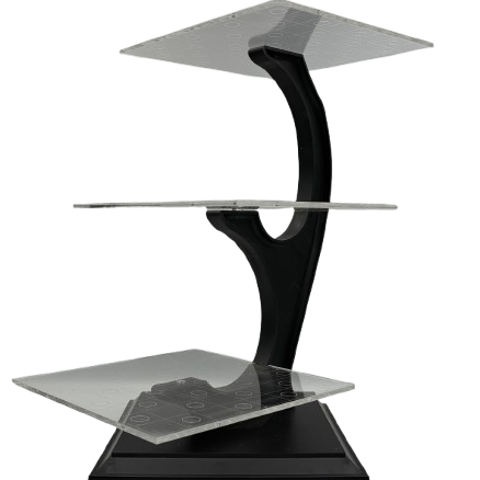 Three level chess game with clear levels and a black stand. 